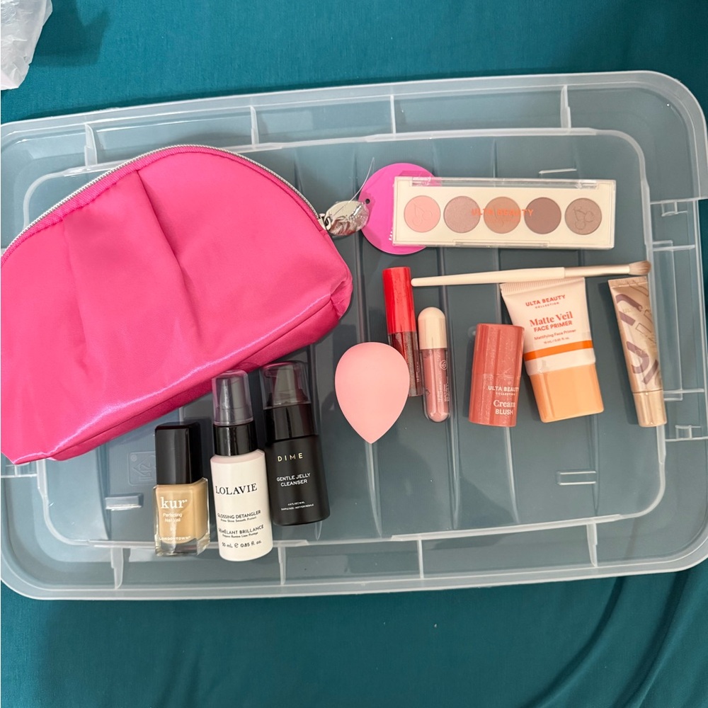 Pink Makeup Bag with Assorted Cosmetics